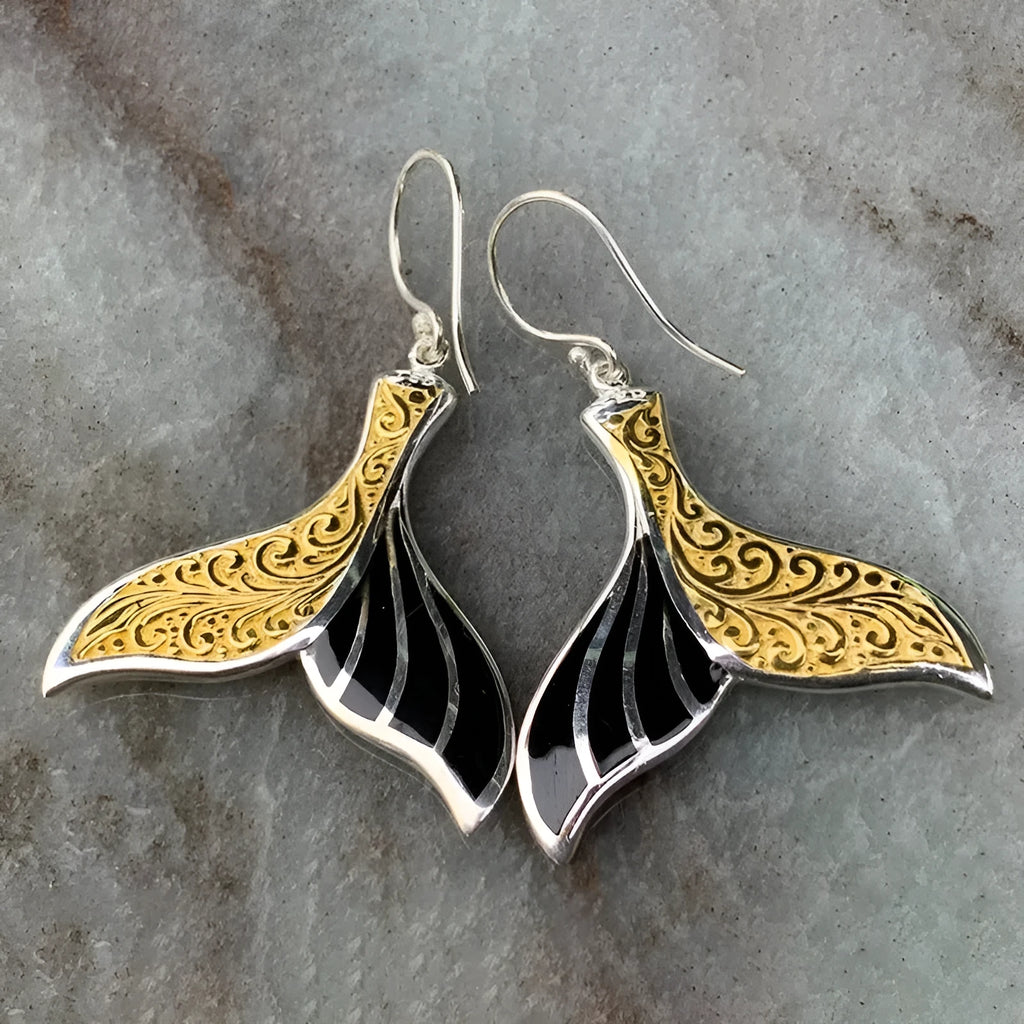 Women's fishtail design earrings with whale motifs in white gold colour alloy