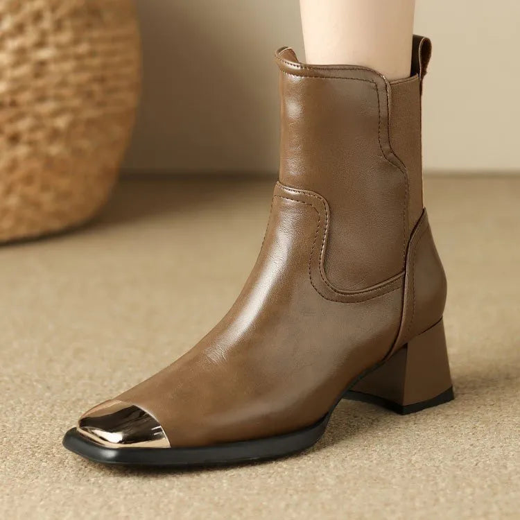 Brown cowhide Martin ankle boots with side zipper and decorative metal rivet details