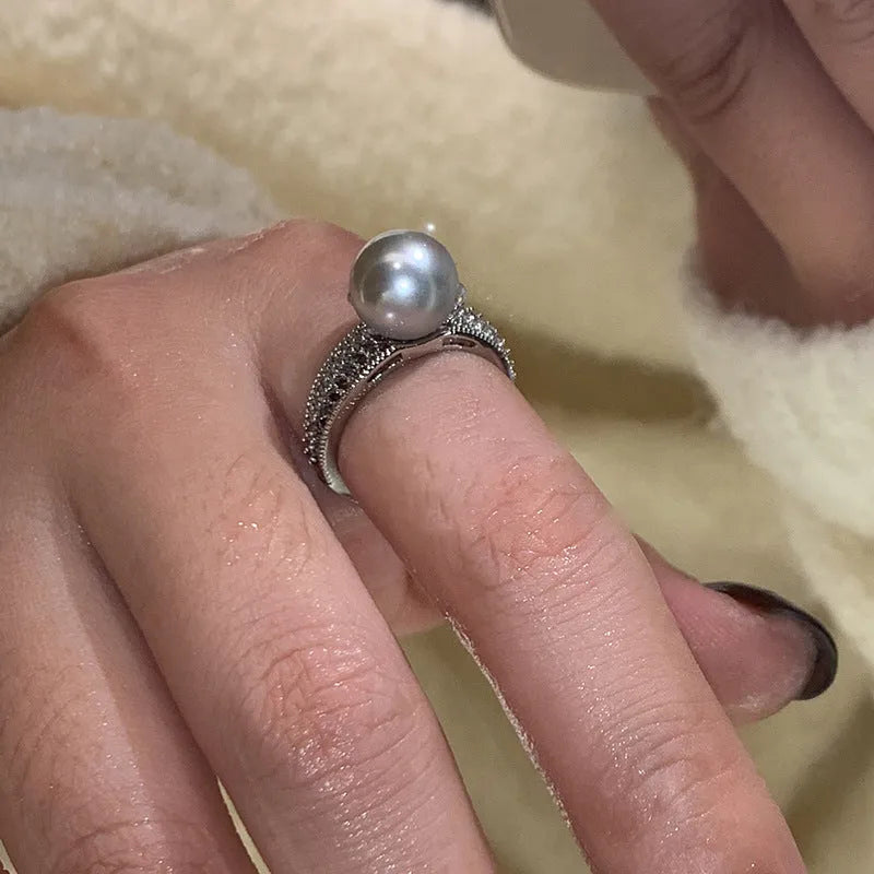 Adjustable geometric copper ring for women with open design showing J5475 colour variation
