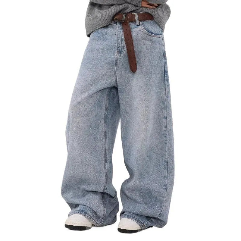Men's blue straight leg jeans with a distressed retro wash and a mid-rise waist.