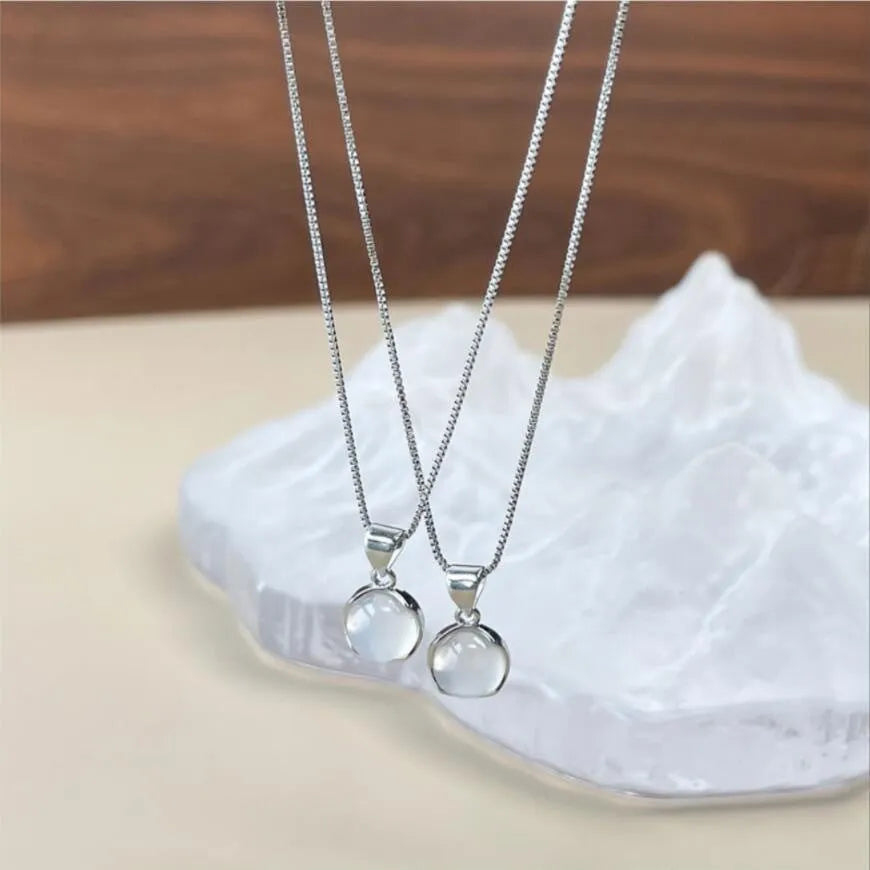 Women's adjustable oval pendant necklace with artificial crystal star design on a box chain in X7 6 Moon Light colour