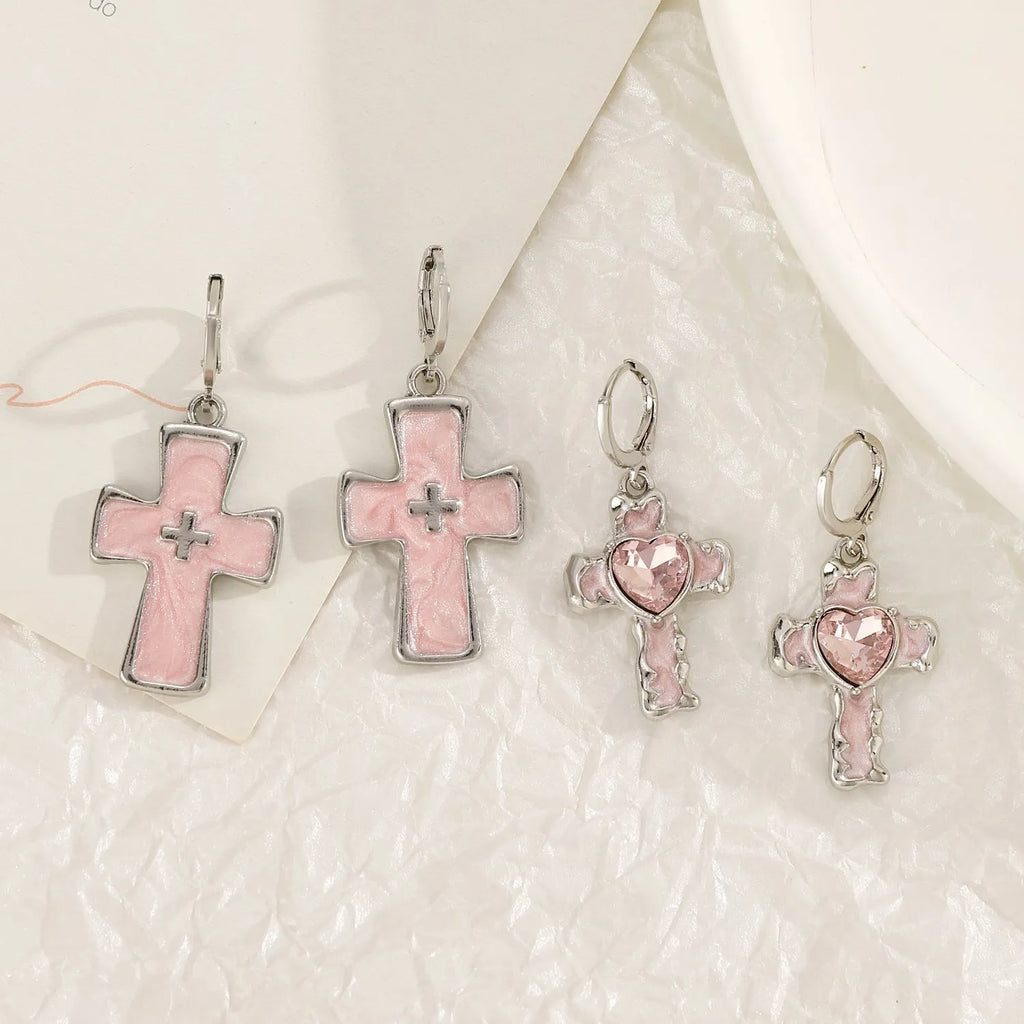Women's alloy earrings with dripping oil treatment in five colour options showing cross and heart designs