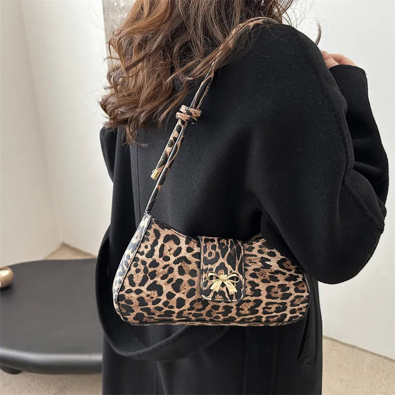 Casual women's handbag with sandwich pocket design in black, brown, coffee, or khaki colour options