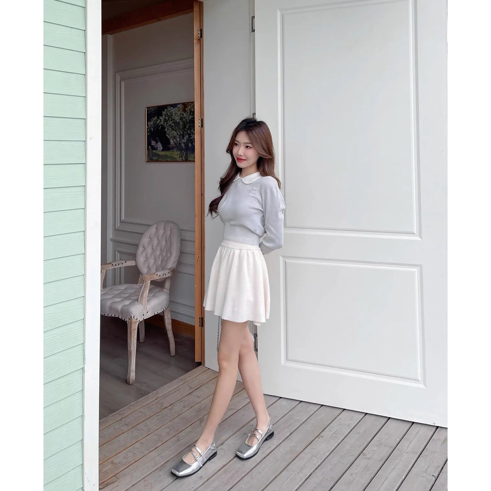 Women's silver genuine sheepskin leather Mary Jane flats with cross buckle strap, round toe, and low flat heel.