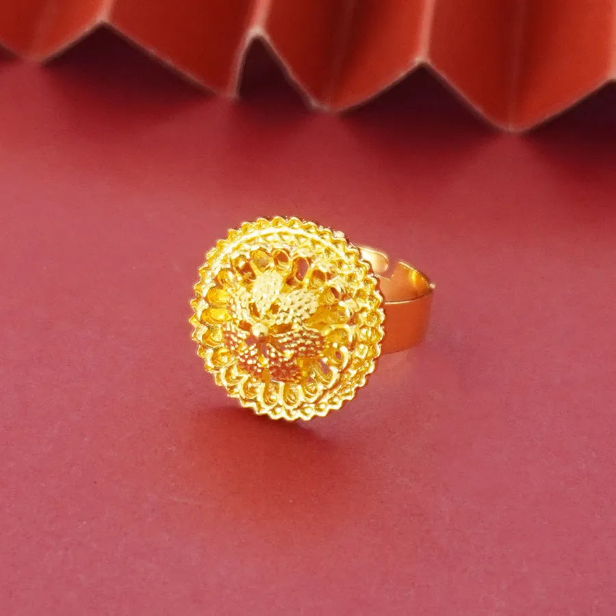 Gold-plated three-piece jewellery set with floral design, showing necklace, earrings, and ring with electroplated finish