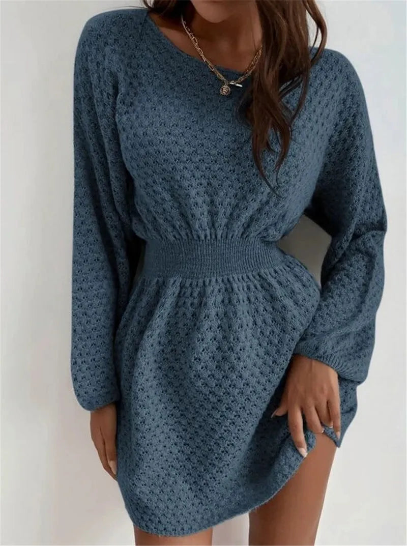 Blue women's knitted dress with hand-crocheted flower details, fitted waist, and 65cm length