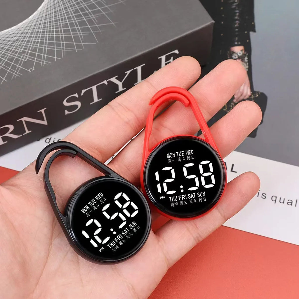 LED luminous electronic watch in black with plastic strap and digital display, showing time with waterproof rating