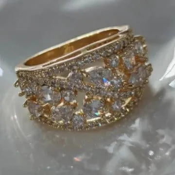 Women's round hollow fashion ring in copper with gold or platinum plating options