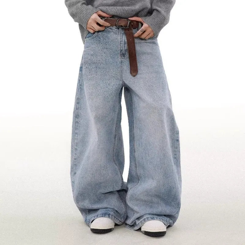Men's blue straight leg jeans with a distressed retro wash and a mid-rise waist.