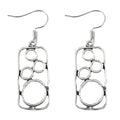 Pair of antique silver geometric earrings with an irregular square stud and round ring on zinc alloy posts.