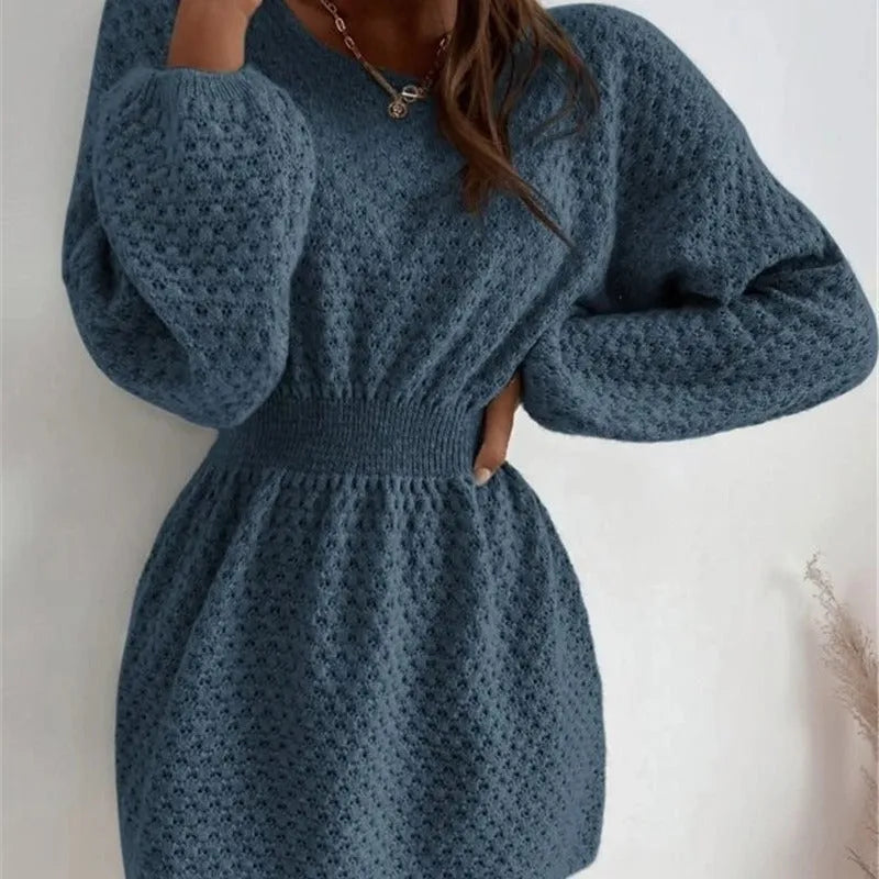 Blue women's knitted dress with hand-crocheted flower details, fitted waist, and 65cm length