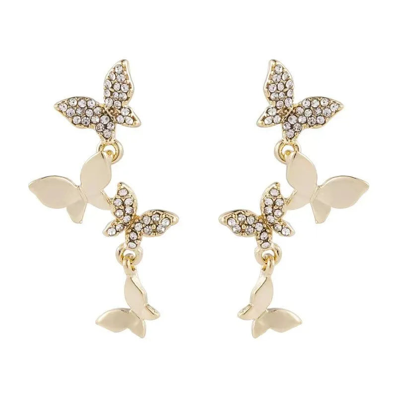 Women's gold-coloured copper butterfly earrings with four butterfly drop design