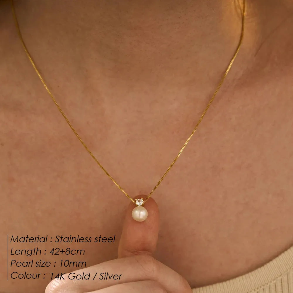 St Delan stainless steel necklace with imitation pearl and zircon pendant in gold and steel colour options