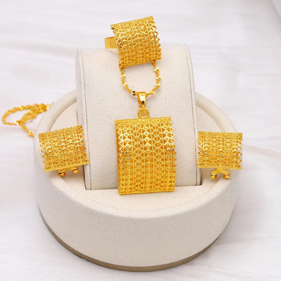 Golden colour bridal jewelry set with copper necklace, earrings, and ring combination