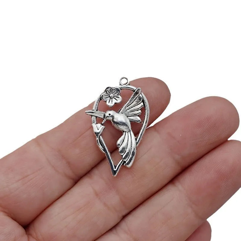 Alloy magpie pendant with electroplated P234 finish for DIY jewellery making