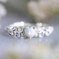 White heart-shaped women's alloy ring with electroplated finish, shown in size options 5-11