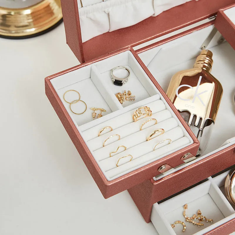 PU leather jewellery storage box measuring 22.5cm wide with hard structure and solid colour finish