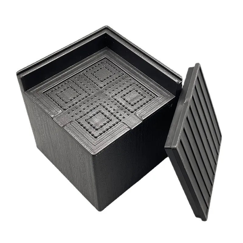 Four black plastic bed foot mats showing 2.5cm height increase for furniture legs