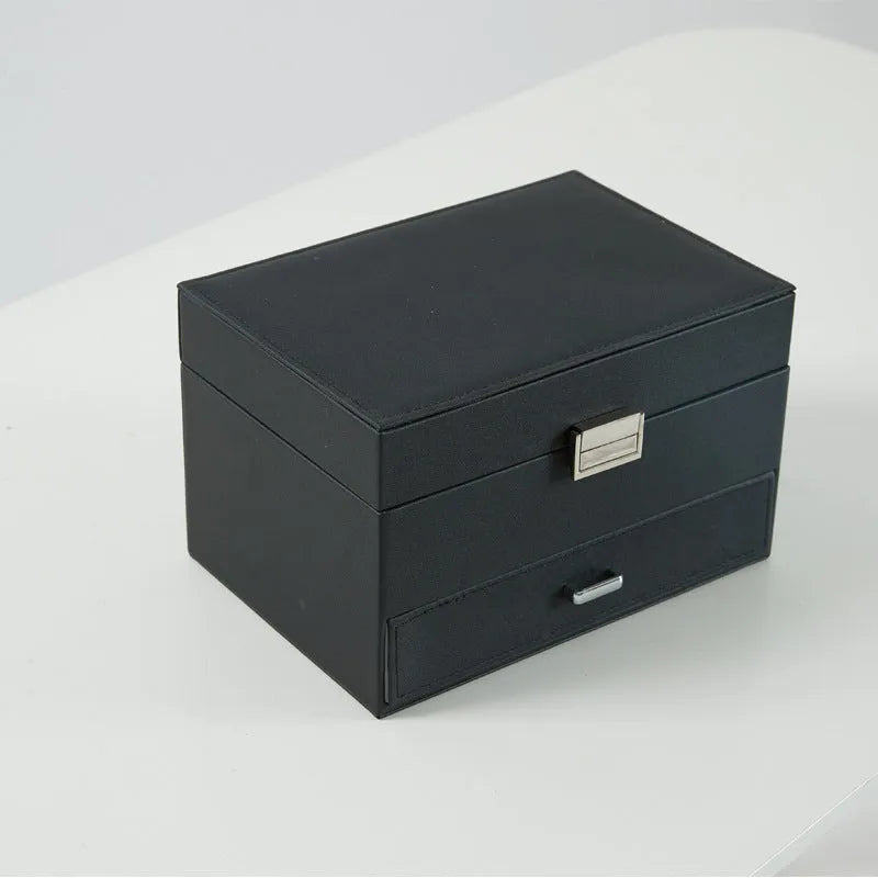 PU leather jewellery storage box measuring 22.5cm wide with hard structure and solid colour finish