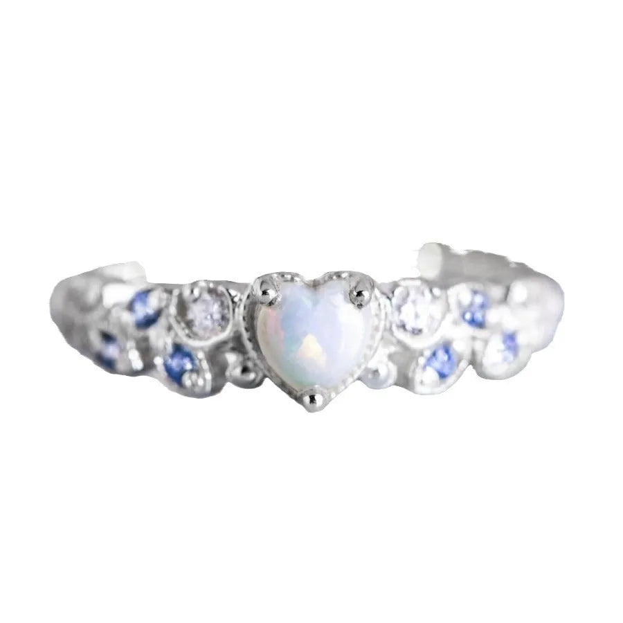 White heart-shaped women's alloy ring with electroplated finish, shown in size options 5-11