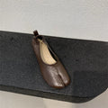 Women's round-toe chunky heel pumps with horseshoe split toe in apricot, black, or brown colours
