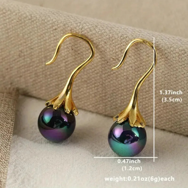 Retro fashion women's earrings with electroplated imitation gold finish on alloy, showing post-and-clutch backing.