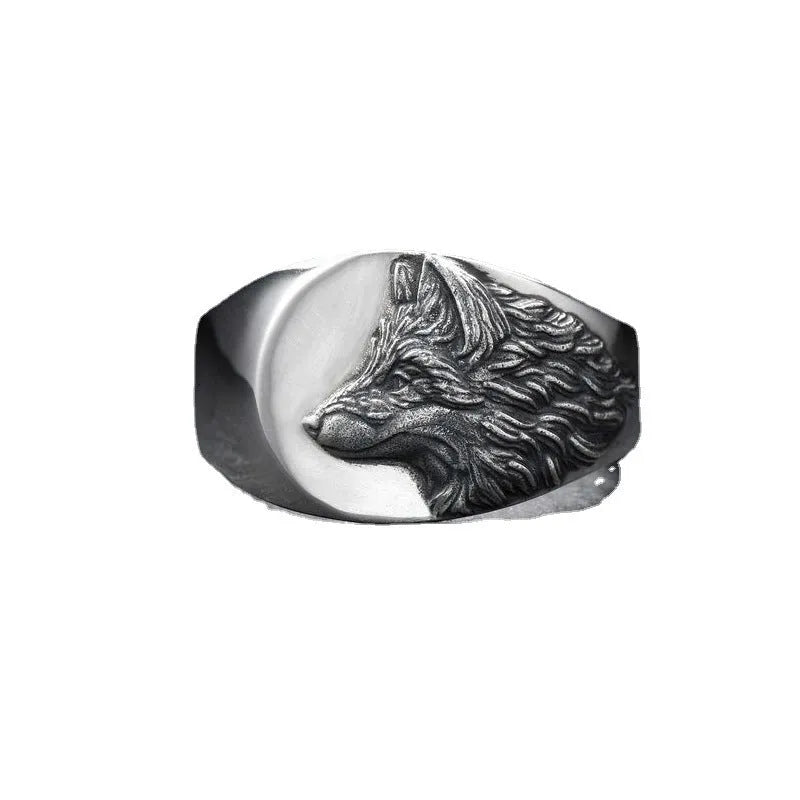 Men's silver geometric wolf head ring showing detailed alloy construction and clean angular lines