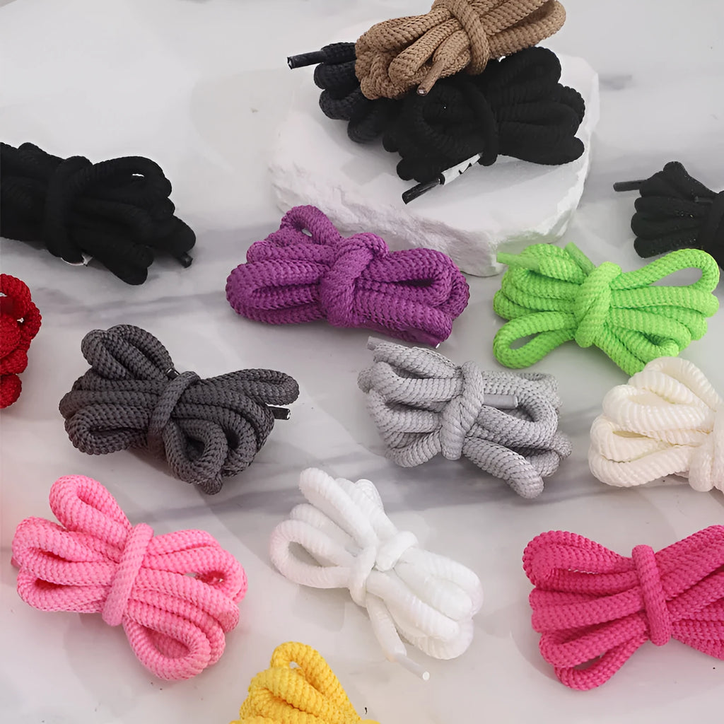 A pair of oval 1.0 cm wide shoelaces in various colours and lengths from 120cm to 160cm.