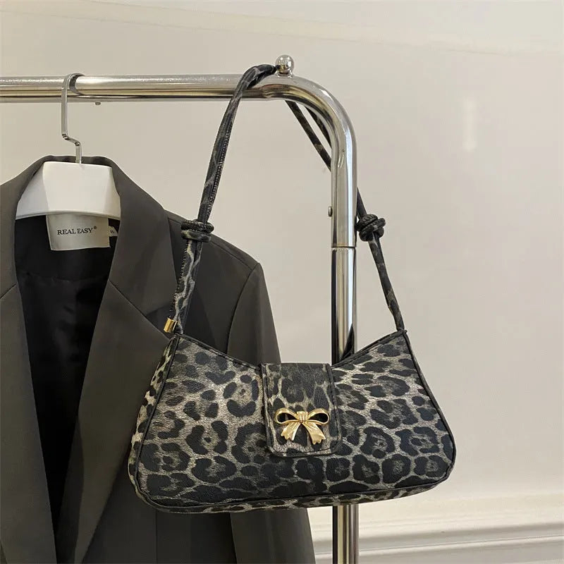 Casual women's handbag with sandwich pocket design in black, brown, coffee, or khaki colour options