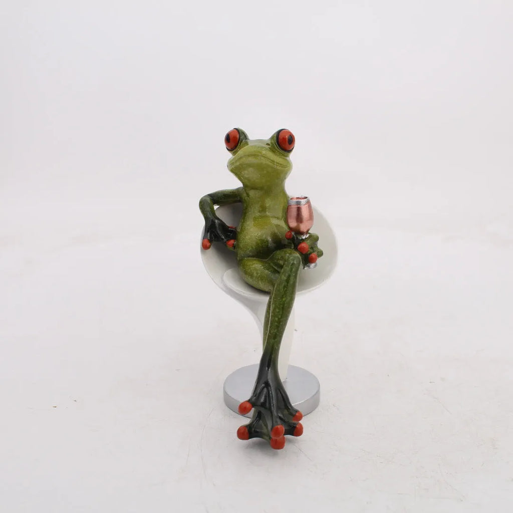 Pastoral style resin frog decoration on wooden shelf, showing hand-finished details and natural colour tones