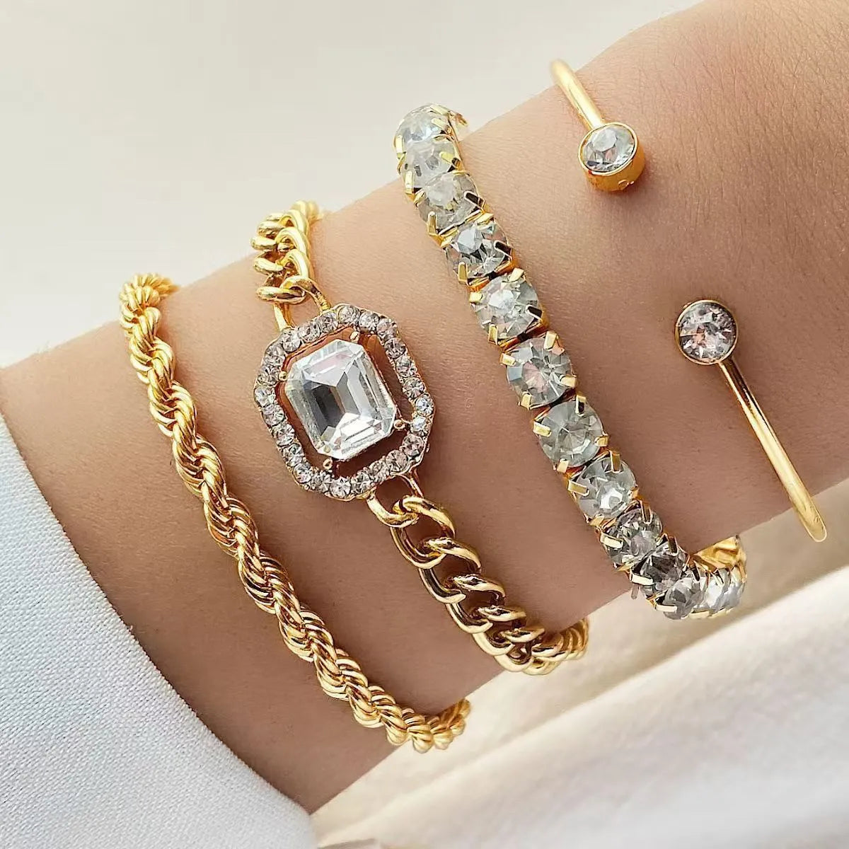 Artistic retro geometric alloy jewellery four-piece set with square diamond shapes in gold finish