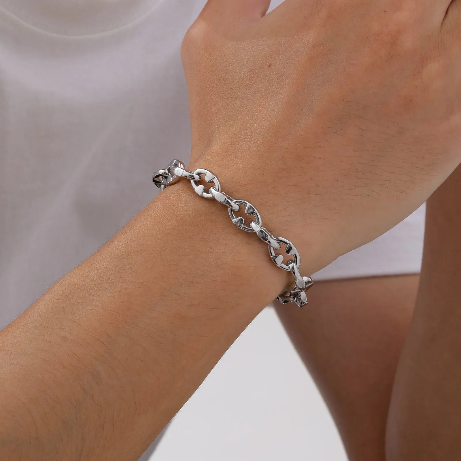 Stainless steel geometric chain bracelet with 6mm thick links and adjustable clasp on wrist
