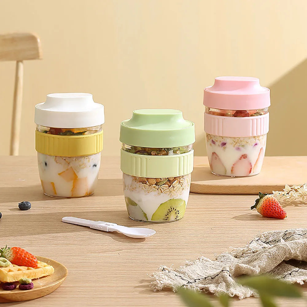 Green plastic salad cup with attached spoon lid showing 480ml capacity measurement