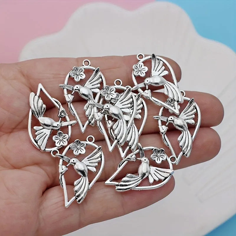 Alloy magpie pendant with electroplated finish measuring 2.5cm height for DIY jewellery making