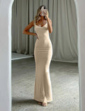 Backless milk silk sling dress with spaghetti straps in Champagne colour