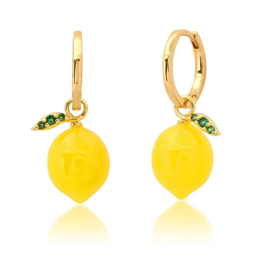 Gold plated copper earrings shaped like carrots, lemons, blueberries, olives, oranges, peaches, and chillies.