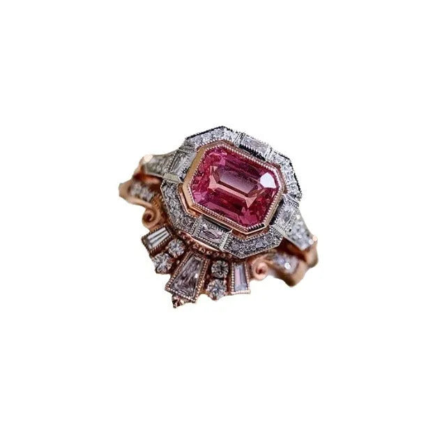 Rose gold alloy women's ring with geometric design and ruby accent, available in sizes 5 to 11.