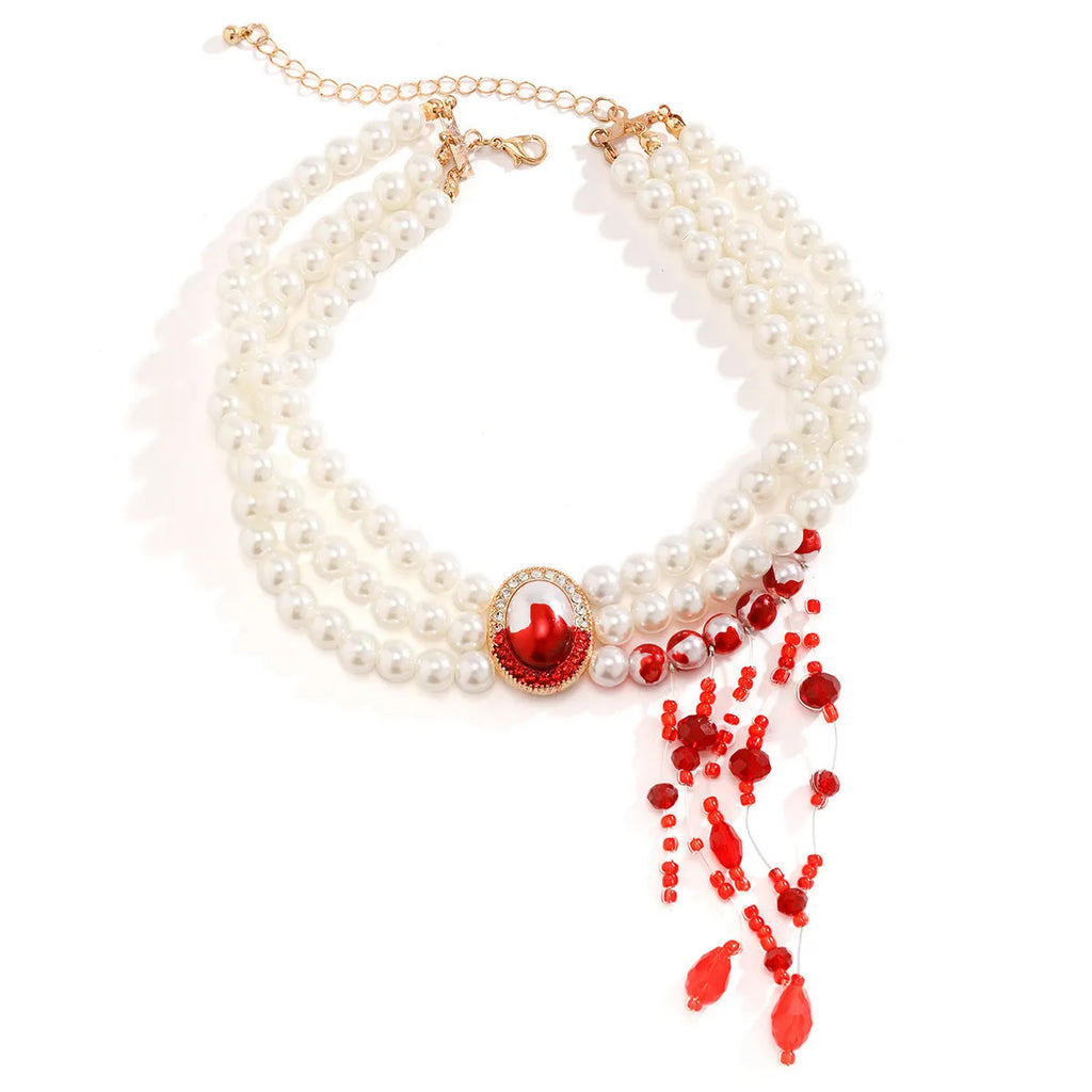Halloween pearl collar jewellery set with gold-toned necklace, bracelet, and ear studs in retro gothic style