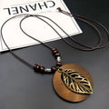 Vintage wooden leaf necklace with electroplated finish on wax line chain, ethnic national style design