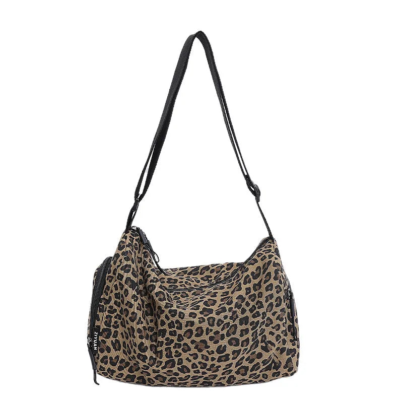 Unisex leopard print messenger bag with striped pattern, crossbody shoulder design
