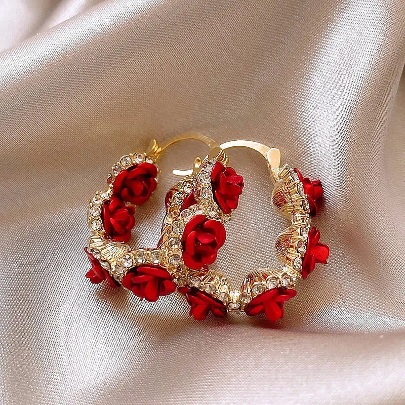 Red floral alloy clip-on earrings with rose detail for women