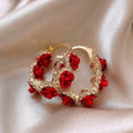 Red floral alloy clip-on earrings with rose detail for women