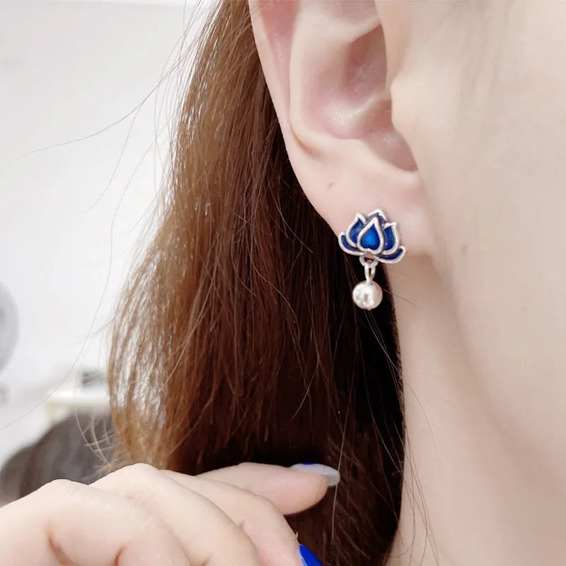Blue lotus earrings with retro artistic seedpod tassel design, 1.2cm wide alloy studs with silver needle fastening
