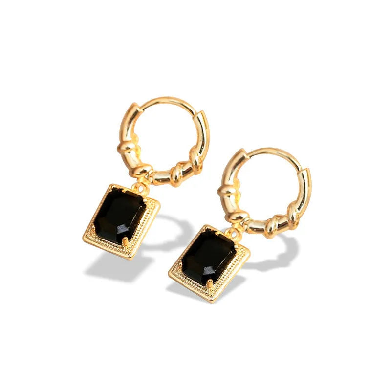Geometric copper earrings with black zircon accents in quadrilateral design