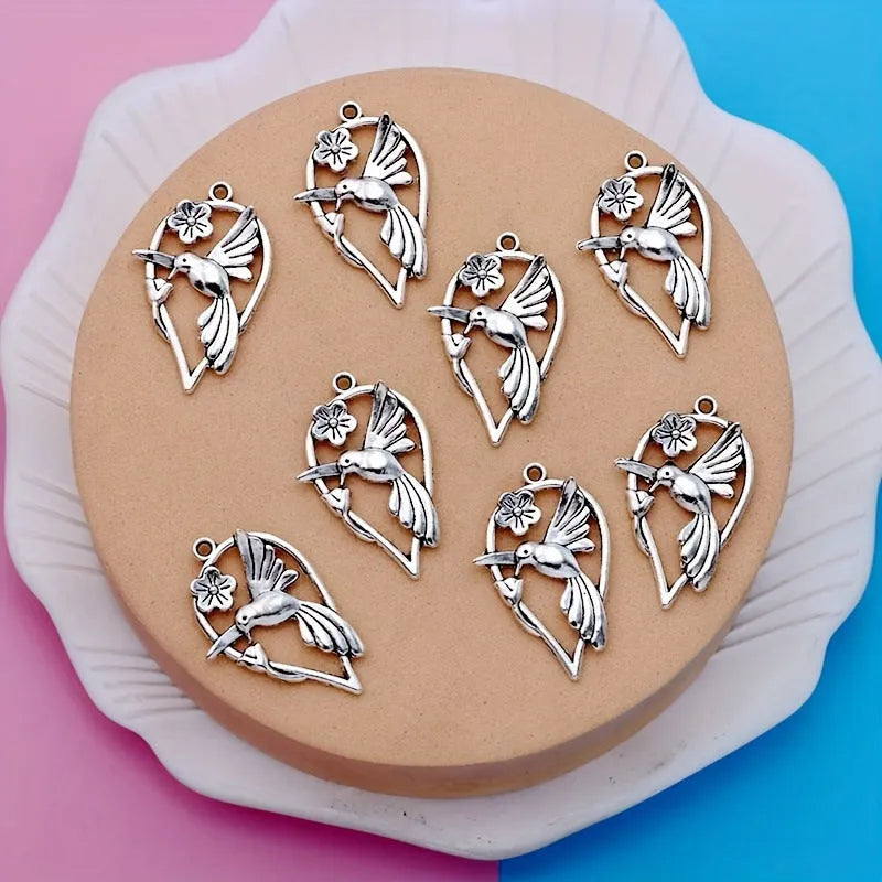 Alloy magpie pendant with electroplated finish measuring 2.5cm height for DIY jewellery making