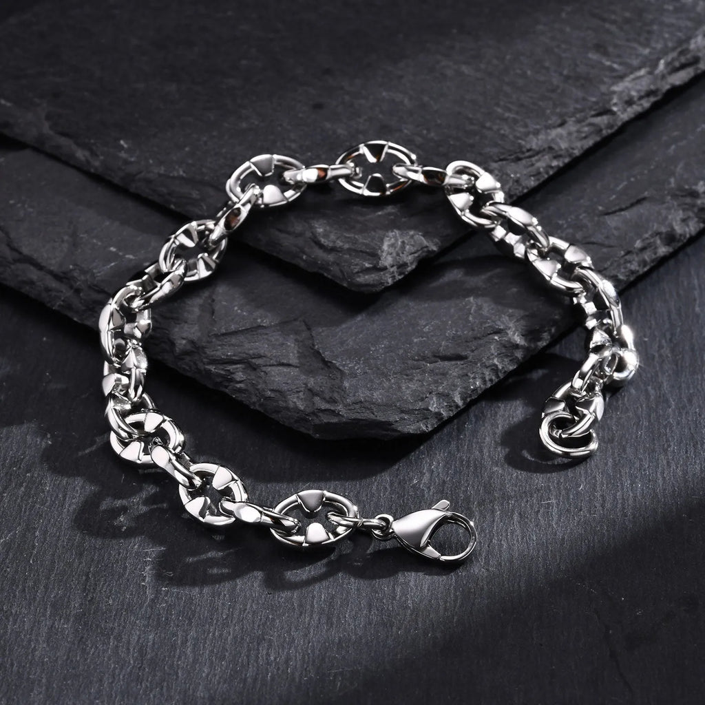 Stainless steel geometric chain bracelet with 6mm thick links and adjustable clasp on wrist