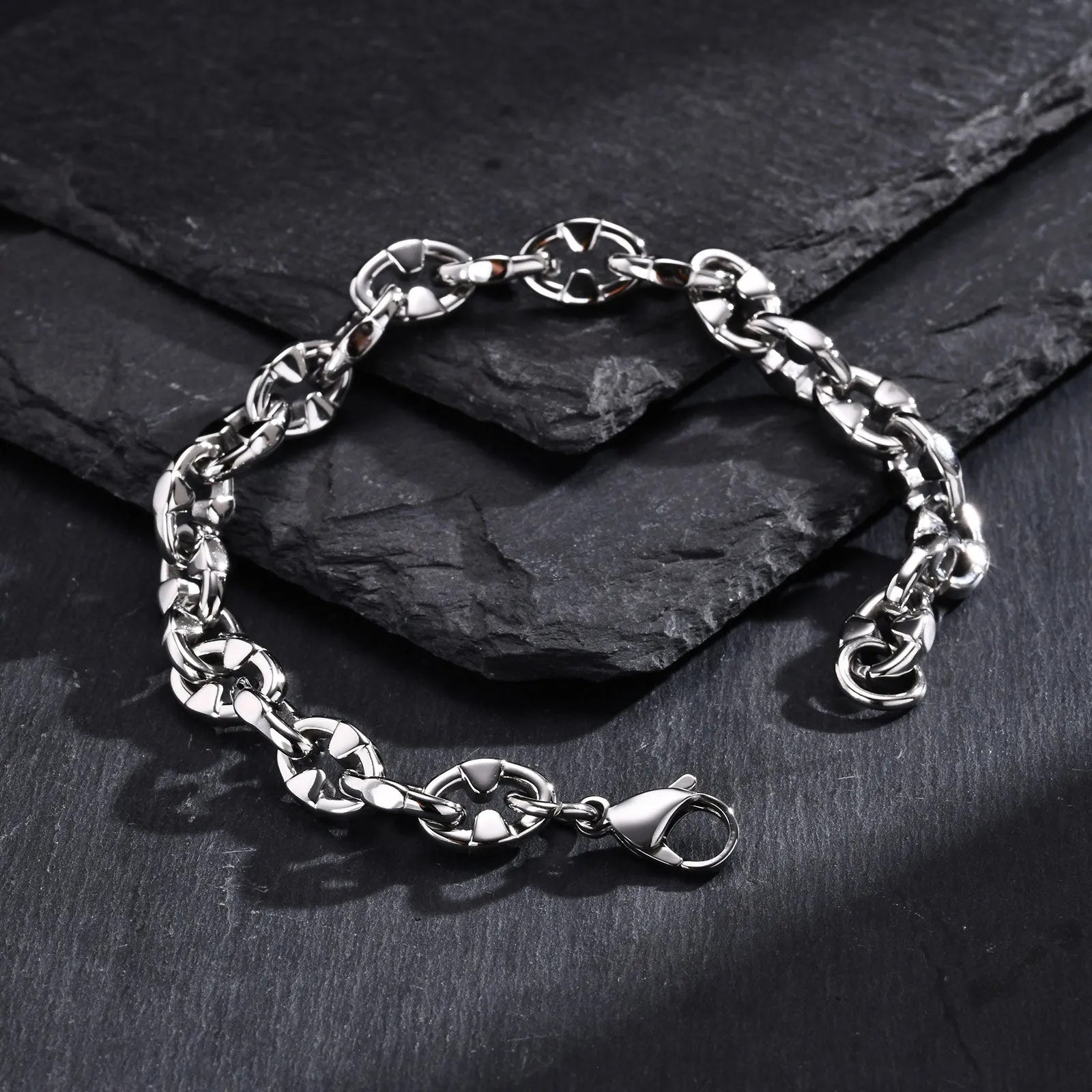 Stainless steel geometric chain bracelet with 6mm thick links and adjustable clasp on wrist