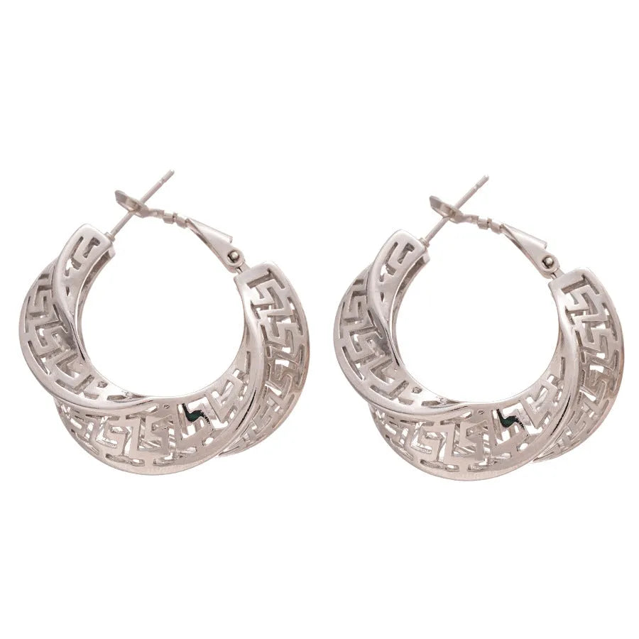 Geometric twisted round hollow stud earrings in silver or gold finish, 2.5cm diameter