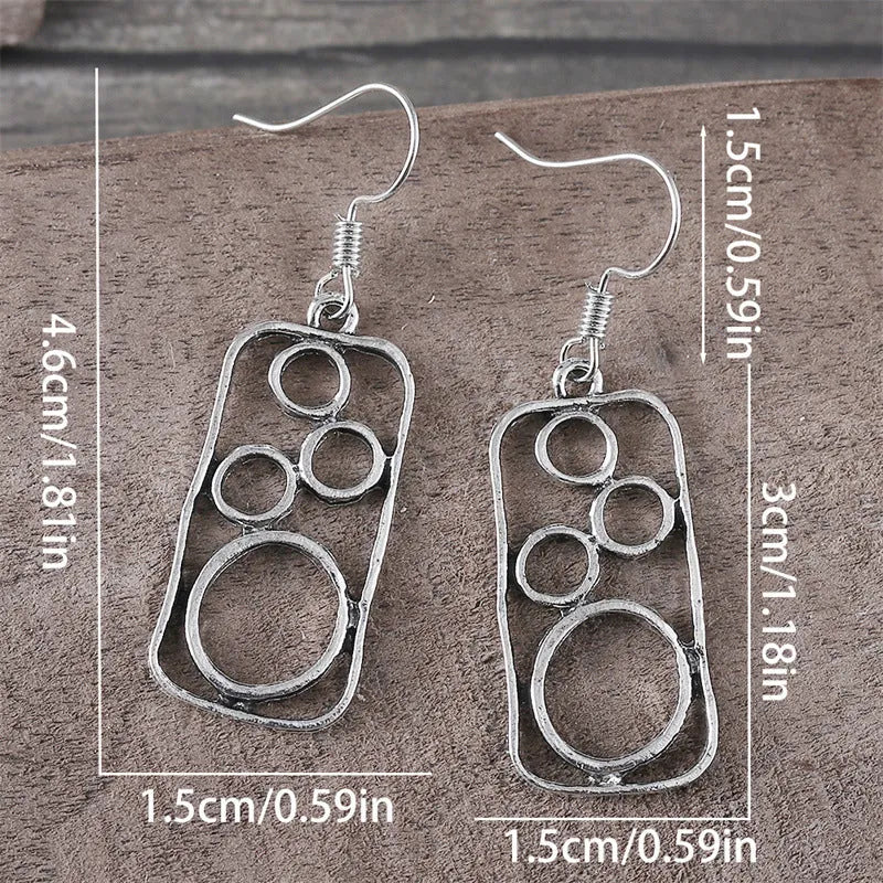 Pair of antique silver geometric earrings with an irregular square stud and round ring on zinc alloy posts.