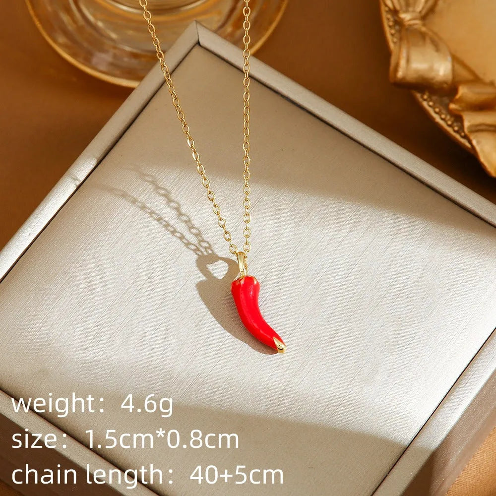 Titanium steel necklace with O-ring chain and delicate fruit pendant in golden cherry finish